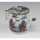 A 19th Century Japanese cylindrical teapot with angular handle decorated with butterflies and