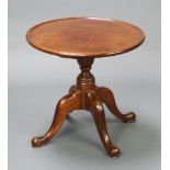 A 19th Century circular mahogany tray top wine table raised on pillar and tripod base (formerly