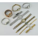 A lady's Pulsar paste set gilt wristwatch and 9 others