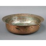 A circular Eastern copper cooking pot 12cm h x 43cm diam.