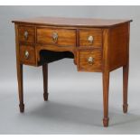 A Georgian mahogany bow front sideboard fitted a drawer flanked by 4 short drawers with