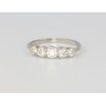 An Edwardian style platinum 5 stone diamond ring, 0.75ct, size N, 2.4 grams