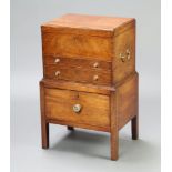 A Georgian Anglo Indian rectangular mahogany cabinet, the hinged lid revealing a fitted interior