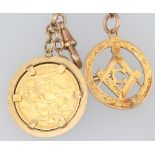 A 9ct yellow gold Albert chain with ditto Masonic fob together with a Victorian 1889 sovereign,