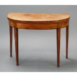 A 19th Century bleached mahogany D shaped card table with inlaid satinwood stringing, raised on