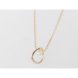 A 9ct yellow gold heart shaped pendant and chain, gross 1.5 grams 40cm