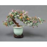 A jade tree contained in a celadon vase 35cm x 54cm x 18cm
