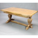 A carved oak dining suite comprising refectory style draw leaf dining table raised on square cup and