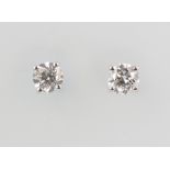 A pair of 18ct white gold brilliant cut diamond ear studs 1.08ct, 2 grams