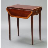 A 19th Century crossbanded mahogany Pembroke table fitted a frieze drawer and raised on square