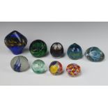 A Caithness Millennium paperweight 7cm and 8 others One is chipped