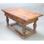 A 18th Century Dutch style rectangular table fitted 1 long drawer, the top formed of 4 planks,