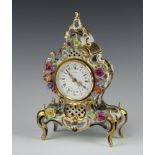 A 20th Century Dresden Reine Handarbeit rococo style porcelain timepiece decorated with spring