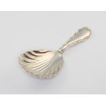 A Georgian style silver caddy spoon with shell bowl Sheffield 1910, 2.5 grams