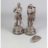 A pair of 19th Century spelter figures of standing warriors raised on socle bases 53cm h x 20cm w