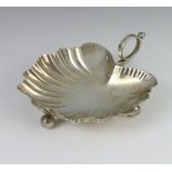 A Victorian silver leaf shaped dish on ball feet Sheffield 1894, 69 grams