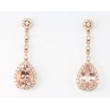 A pair of 18ct rose gold pear cut morganite approx. 5.74ct and diamond approx. 1.01ct earrings 35mm,