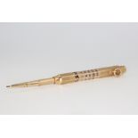 A 9ct yellow gold enamelled S Mordan & Co calendar propelling pencil, 11.5cm, gross weight 24.7
