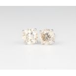A pair of 18ct white gold single stone diamond ear studs approx. 2.14ct, 2.3 grams