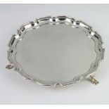 An Art Deco silver card tray with pie crust rim on pad feet Sheffield 1934, 312 grams, 20cm