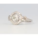 A platinum Art Deco style diamond target ring, centre stone 0.3ct, the remaining brilliant cut