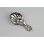 A Georgian style silver caddy spoon with shell bowl and engraved bright cut handle, 15 grams, 8 cm