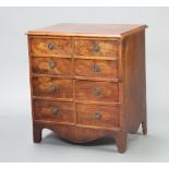 A 19th Century mahogany commode in the form of a 4 drawer chest enclosed by panelled doors 70cm h