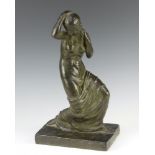 A classical style pottery figure of a semi-clad lady raised on a rectangular base 36cm