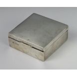A silver square cigarette box 8cm x 8cm Birmingham 1942