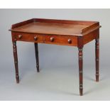 An Edwardian mahogany wash stand with 3/4 gallery fitted 2 drawers, raised on turned supports 76cm h