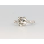 A platinum single stone brilliant cut diamond ring, the centre old cut stone 2.1ct, colour I/J,
