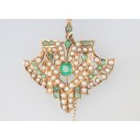 An Indian yellow metal emerald and pearl set pendant, 46mm, 11.6 grams