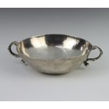 A white metal 2 handled shallow bowl, 156 grams, 16cm