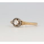 A yellow metal single stone diamond ring approx. 0.1ct, 2.6 grams, size L 1/2