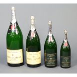 Four Moet & Chandon shop display bottles, 1500cl 89cm h x 20cm diam. (slight damage to label), 900cl