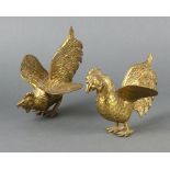 A pair of gilt metal figures of cockerels 14cm x 10cm x 9cm