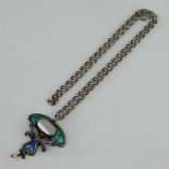 An Art Nouveau silver mother of pearl and enamel pendant 40mm x 30mm on a silver chain 1 panel is