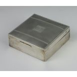 An Art Deco silver engine turned square cigarette box Birmingham 1932, 8cm x 8cm
