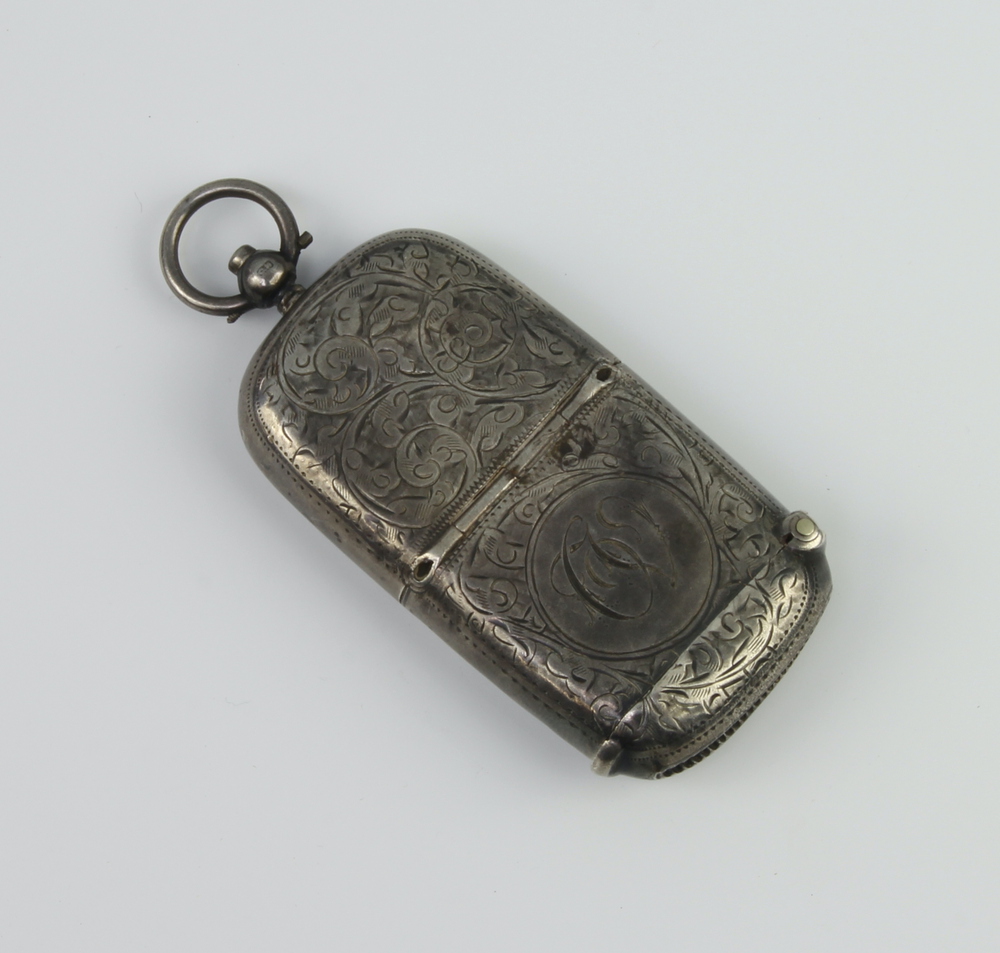 An Edwardian silver, scroll engraved, vesta/sovereign case Birmingham 1903, 42 gramsMinor dents
