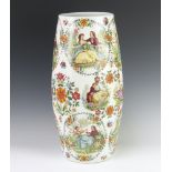 A Continental porcelain baluster vase decorated with fete gallant and floral panels 46cm