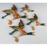 A set of four Beswick duck wall plaques, no.s 596/1, 596/2, 596/3 and 596/4The duck numbered 596/1