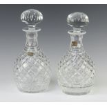 A pair of Whitefriars hobnail cut mallet shaped decanters with mushroom stoppers 25cm