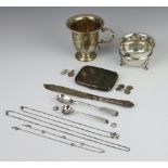 A silver mug with S scroll scroll handle, Chester 1912, a cigarette case and minor wares,