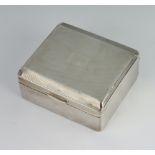 An Art Deco engraved silver cigarette box Birmingham 1937 9cm x 8cm There are numerous dents to
