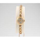A lady's 9ct yellow gold Accurist coronet wristwatch on a ditto bracelet, gross weight 12 grams