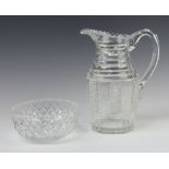 A cut glass jug with hobnail cut decoration, 24cm h, a ditto bowl, 16cm h The bowl has minor chips