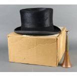 A Lock & Co black hunting top hat together with a copper and brass hunting horn