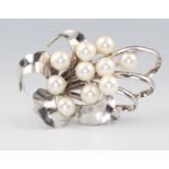 A silver and cultured pearl scroll brooch 5cm 16 grams