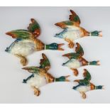 A matched set of Beswick flying ducks 3 marked 596/1/2/3/4, the large other unmarked, 25cm, 20cm,