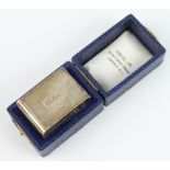 A silver engine turned napkin ring Birmingham 1956 46 grams, contained in a fitted box